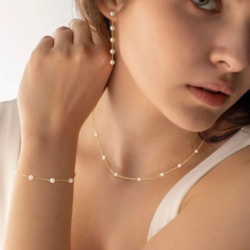 Parure de bijoux perlés